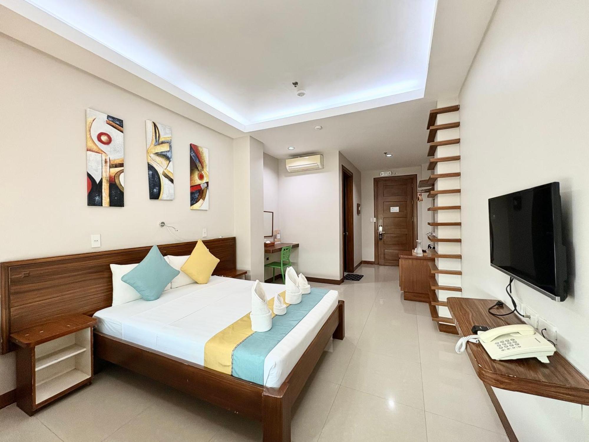 Sunburn Suites And Rooftop Bar Corón Exterior foto